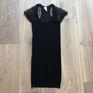 Black bodycon dress with fishnet sleeves